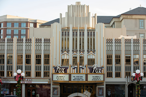 Redwood City, California, USA - January 1, 2023: Sunset bathes the historic downtown Fox Theater in warm light.