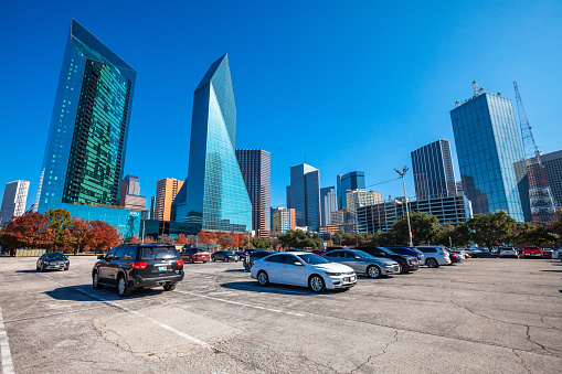 Dallas, Texas, USA - View to downtown highrise buildings over the big parking lot