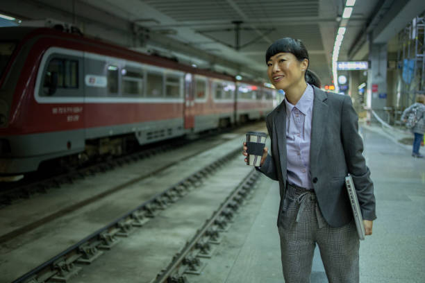istock Woman uses the subway to commute to work 2118394338