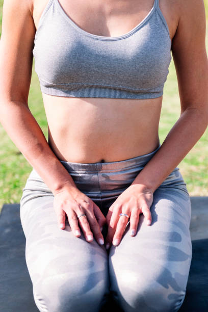 istock unrecognizable woman doing relaxation exercises 2118398711
