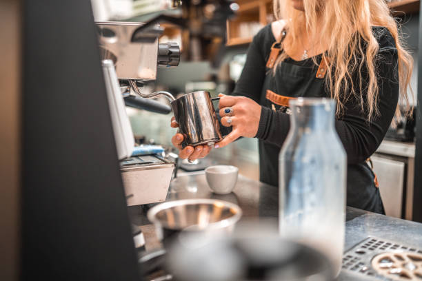 istock Skilled Caucasian Barista Crafting Beautiful Designs 2118410688