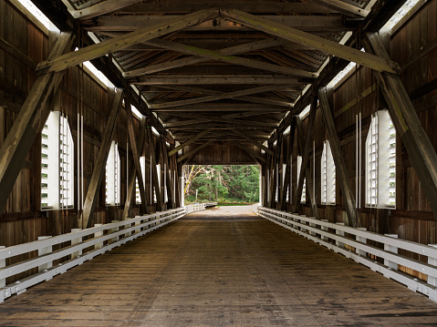 Dorena Covered Bridge interior. Is over the Row River. It is a Historic Landmark in Lane County Oregon. Closest city is Cottage Grove, Oregon, but is near the small community of Dorena, Oregon. Also called the Star Bridge.