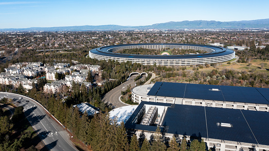 Cupertino, California, USA - January 1, 2023: Afternoon sun shines on Apple Park, the downtown Corporate headquarters of Apple Inc.