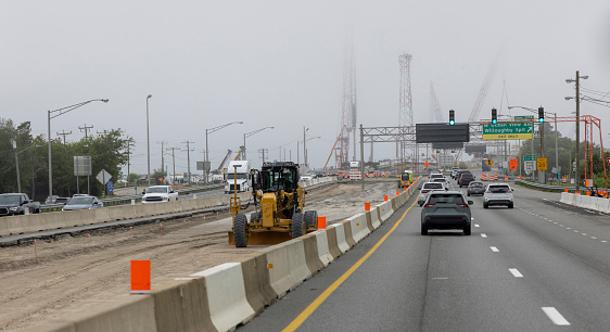 Berkeley bridge renovation: the structure of the Berkley Bridge in Norfolk, Virginia is enhanced while cars continue to transit