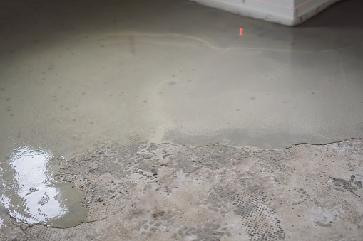 floor partially covering with self-levelling cement mortar.
