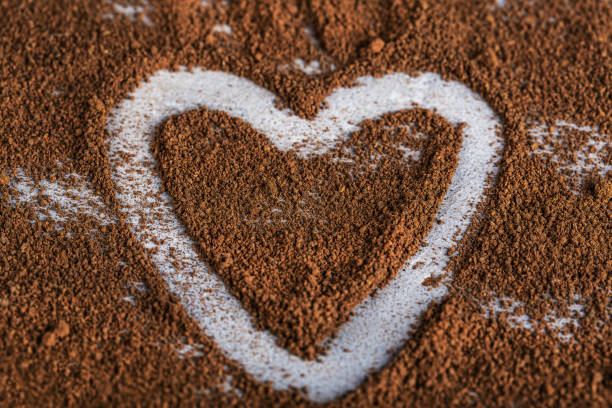 istock freshly roasted ground coffee in heart shape 2118522343
