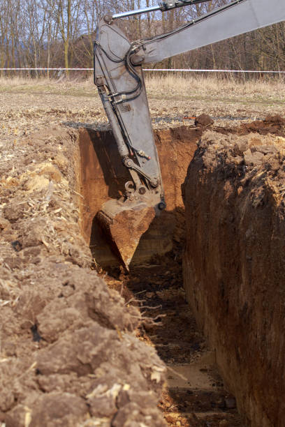 istock Excavator boom and bucket 2118542010