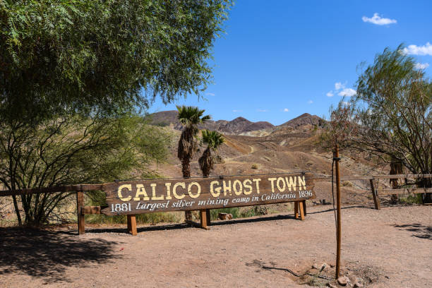 Wood Sign of Calico Ghost Town on a Summer Day - California, USA Calico is a ghost town and former mining town in San Bernardino County, California, United States. calico ghost town california stock pictures, royalty-free photos & images
