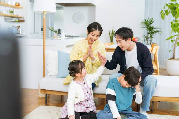 family playing games in the living room