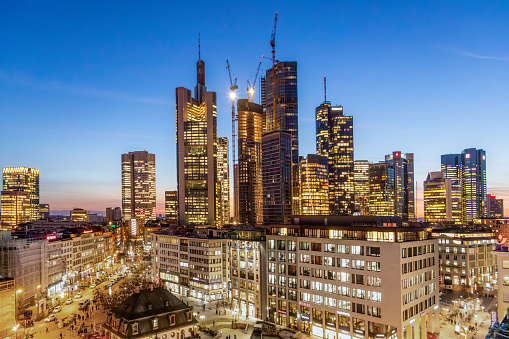 Frankfurt, Germany - February 2, 2024: scenic aerial view to skyline of Frankfurt with skyscraper in dawn