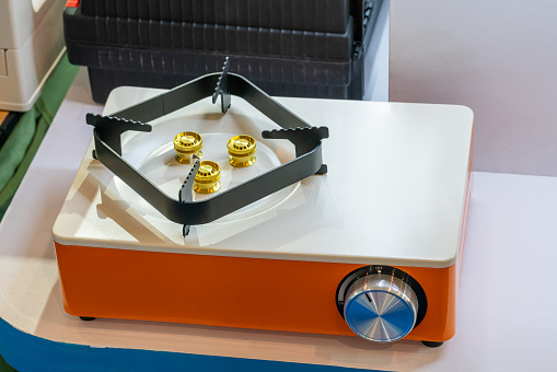 Electric portable stove on a heating element, top view