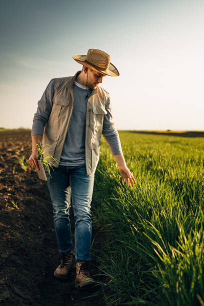 istock farmers outdoor on field 2118983648