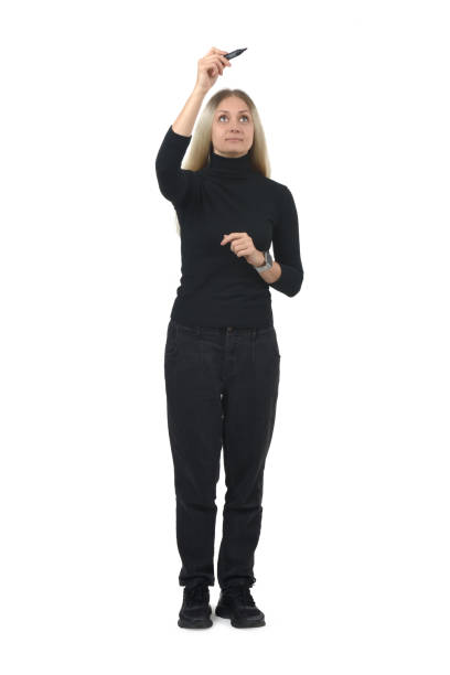 front view of a woman drawing or writing imaginatively upwards on white background.
