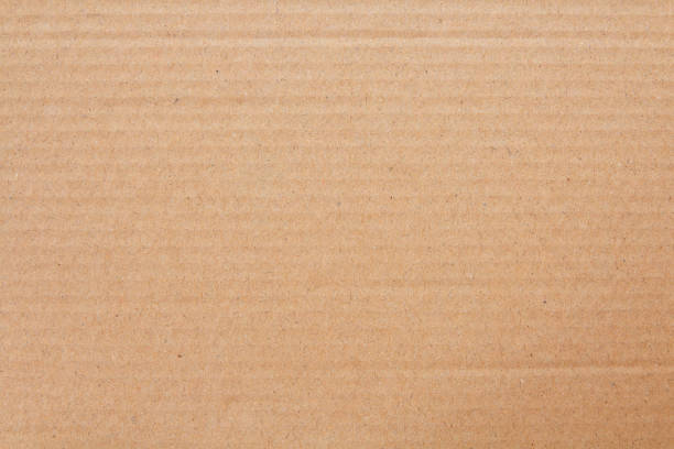 istock Cardboard sheet texture background, detail of recycle brown paper box pattern. 2119026169
