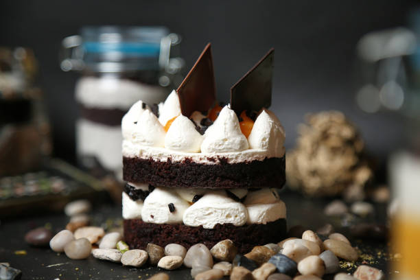 istock Delicious Cake on Wooden Table 2119050789