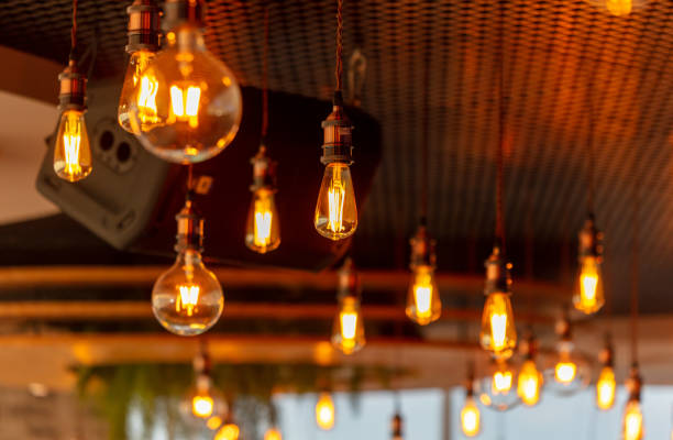 istock Decorative antique edison style filament light bulbs hanging from ceiling 2119119187