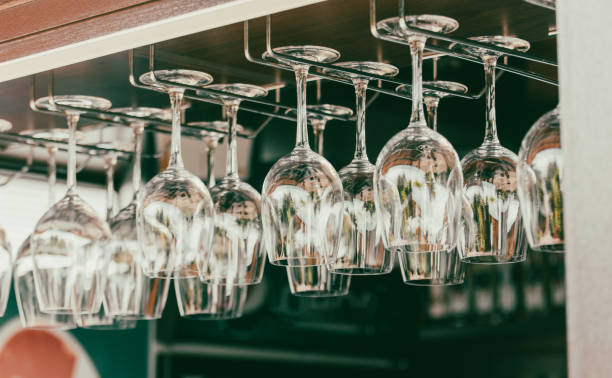 istock Clean glasses hang over the bar 2119123414