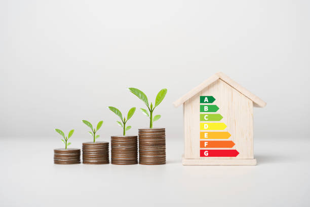 istock House energy efficiency, energy efficient rating class concept, eco home renovation save cost. Low-consumption ecological house. Green Building for Sustainable Development Concept 2119139420