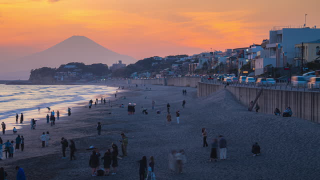 Timelapse Shichirihama beach at Kamakura with Mount Fuji in sunset