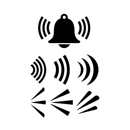Ringing bell icon and sound signal waves over white background