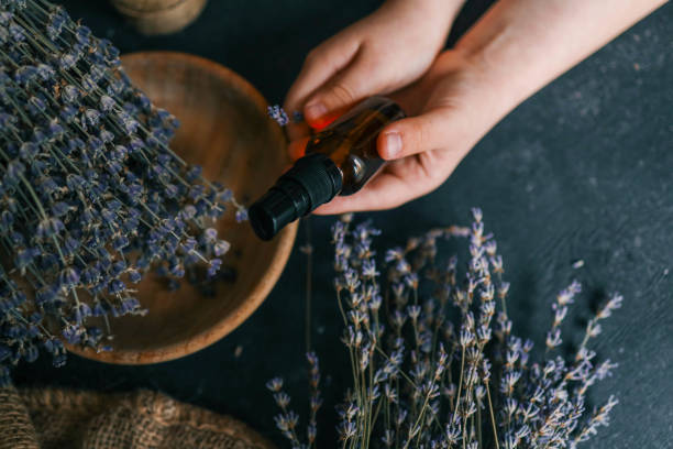 istock Natural cosmetic product with lavender in hands 2119166501