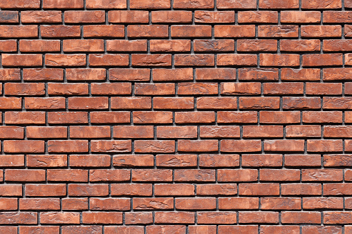 Brick wall covered with snow