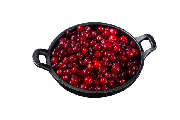 istock Red fresh Cranberry berry in a pan. Isolated on white background. Top view. 2119231051