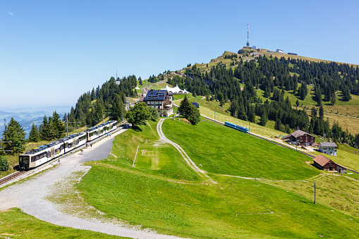 View on Rigi mountain and Arth–Rigi railway train line rack railway in Swiss Alps in Switzerland