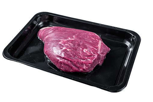 Raw cap rump steak or top sirloin beef meat steak in vacuum packaging.  Isolated on white background. Top view