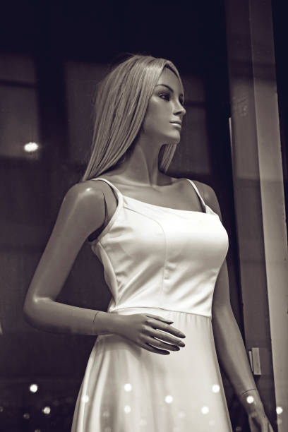 A beautiful mannequin standing in the window