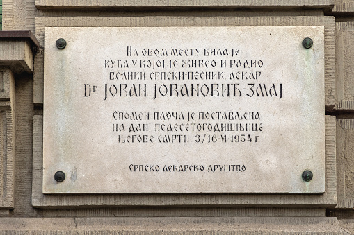 Belgrade, Serbia - October 01, 2021: Memorial Plaque to Famouse Doctor and Poet Dr Jovan Jovanovic Zmaj at House Wall in Kneza Milosa Street in Capital City Centre.