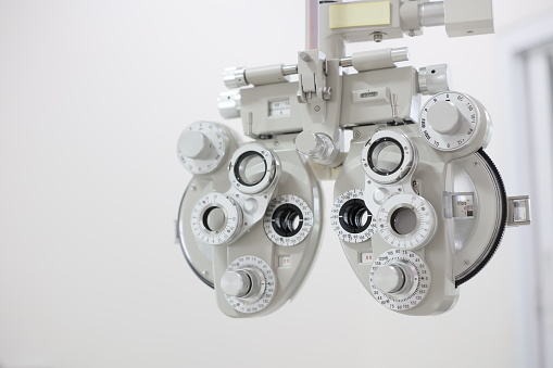 Phoropter for eye test, lenses glasses for eye check in optical store