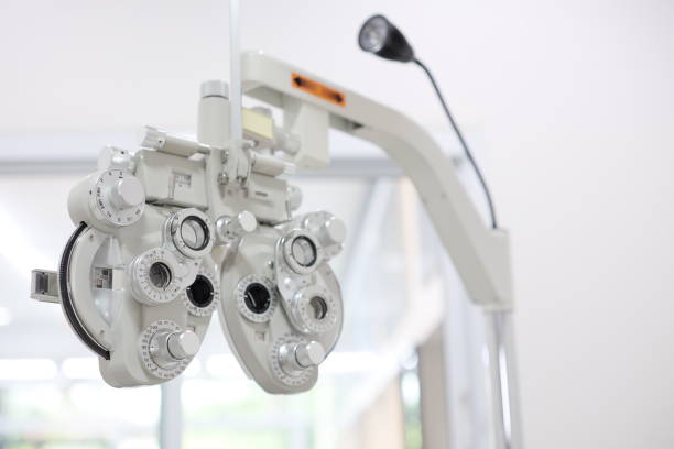 istock Phoropter for eye test, lenses glasses for eye check in optical store 2119425608
