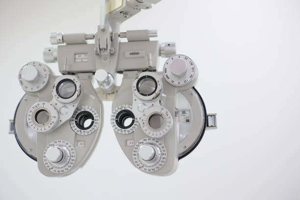 istock Phoropter for eye test, lenses glasses for eye check in optical store 2119427148