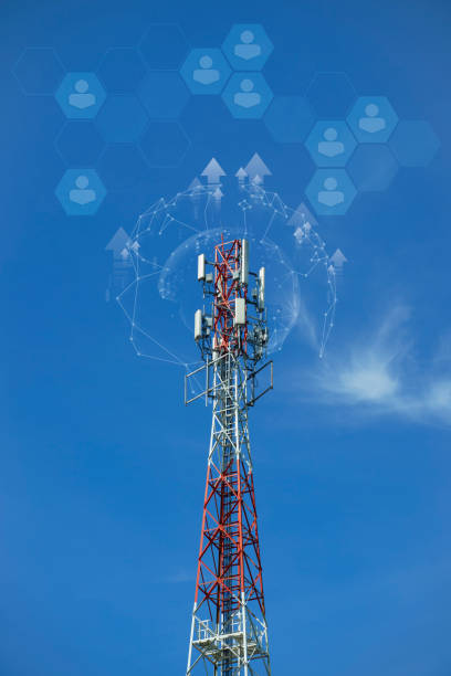 istock a tower with antennas that broadcasts a signal against a blue sky with clouds, wireless telecommunication technology, Global connection and internet. 2119513337