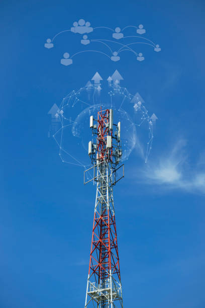 a tower with antennas that broadcasts a signal against a blue sky with clouds, wireless telecommunication technology, Global connection and internet.