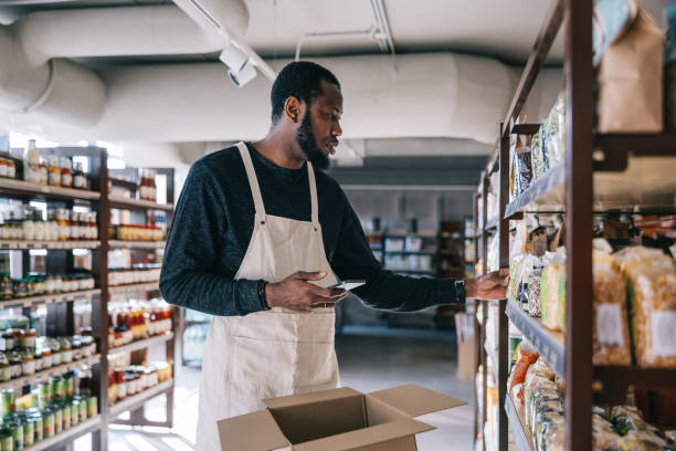 istock African organic store worker expertly picks items for a customer's online order 2119519045
