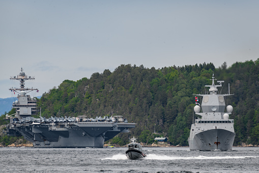 USS Gerald R. Ford aircraft carrier on it's departure from visiting Oslo port in 2023