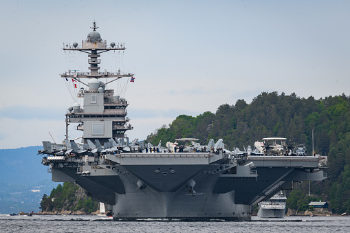 USS Gerald R. Ford aircraft carrier on it's departure from visiting Oslo port in 2023