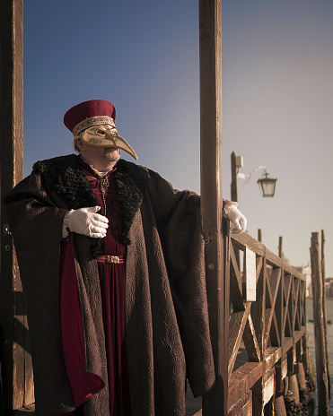 Venice, Italy – March 03, 2022: The Carnival Parade in Venice, Italy on March 3th 2022. In that image a mysterious man, apparently a noble.