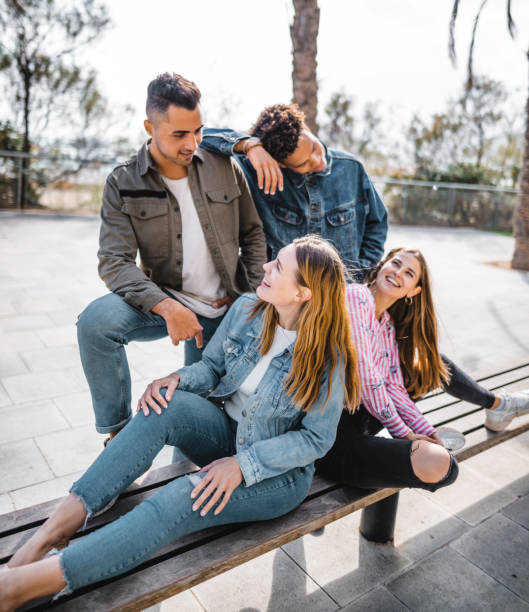 istock friends all together in the bench 2119630789