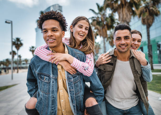 istock friends embracing in Barceloneta 2119636561