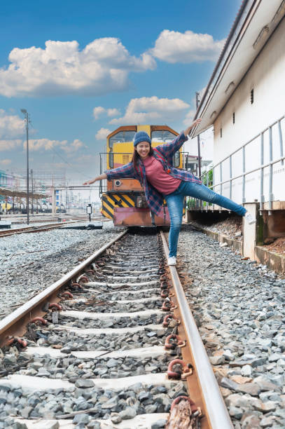 Young Asian tourist traveling on train