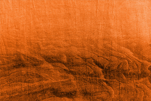 Empty and blank abstract textured dark orange, peach rust brown colored grunge textured horizontal classic style stained faded and weathered vector background with cracks texture all over like rough surface with abrasions and vignette  - suitable to use as backdrops, vintage post cards, letters, manuscripts etc.