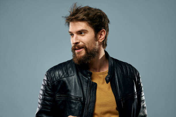 cute bearded man musician leather jacket attractive look lifestyle. High quality photo