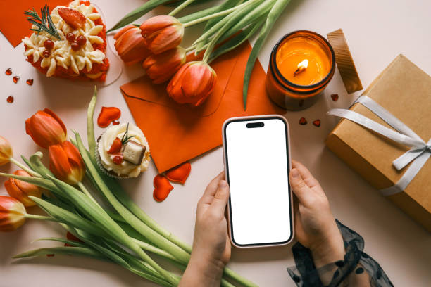 istock Phone with isolated screen on background of spring decor 2119774409