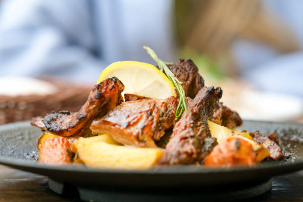 beef with vegetables, rosemary and lemon