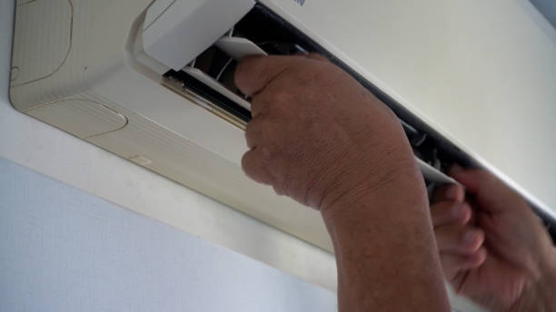 istock Repair and fix air conditioner at home. 2119786188