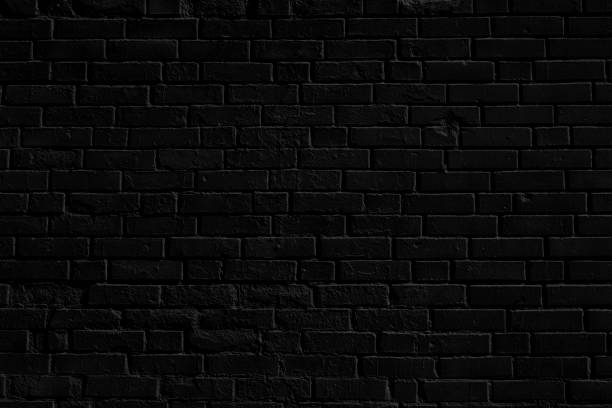 istock Black brick building wall. Interior of a modern loft. 2119792372