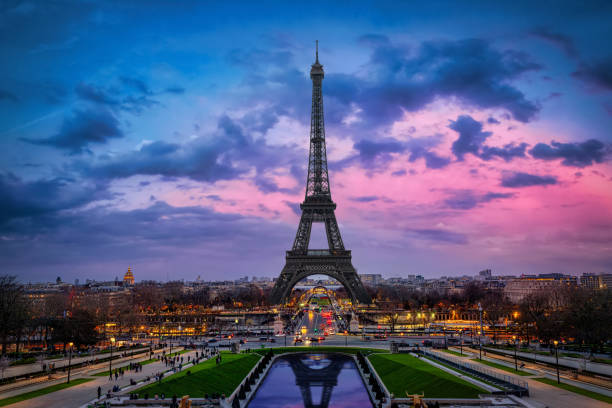 Spring evening view of the Eiffel Tower in Paris Beautiful spring evening view of the Eiffel Tower and skyline of Paris, France eiffel tower stock pictures, royalty-free photos & images